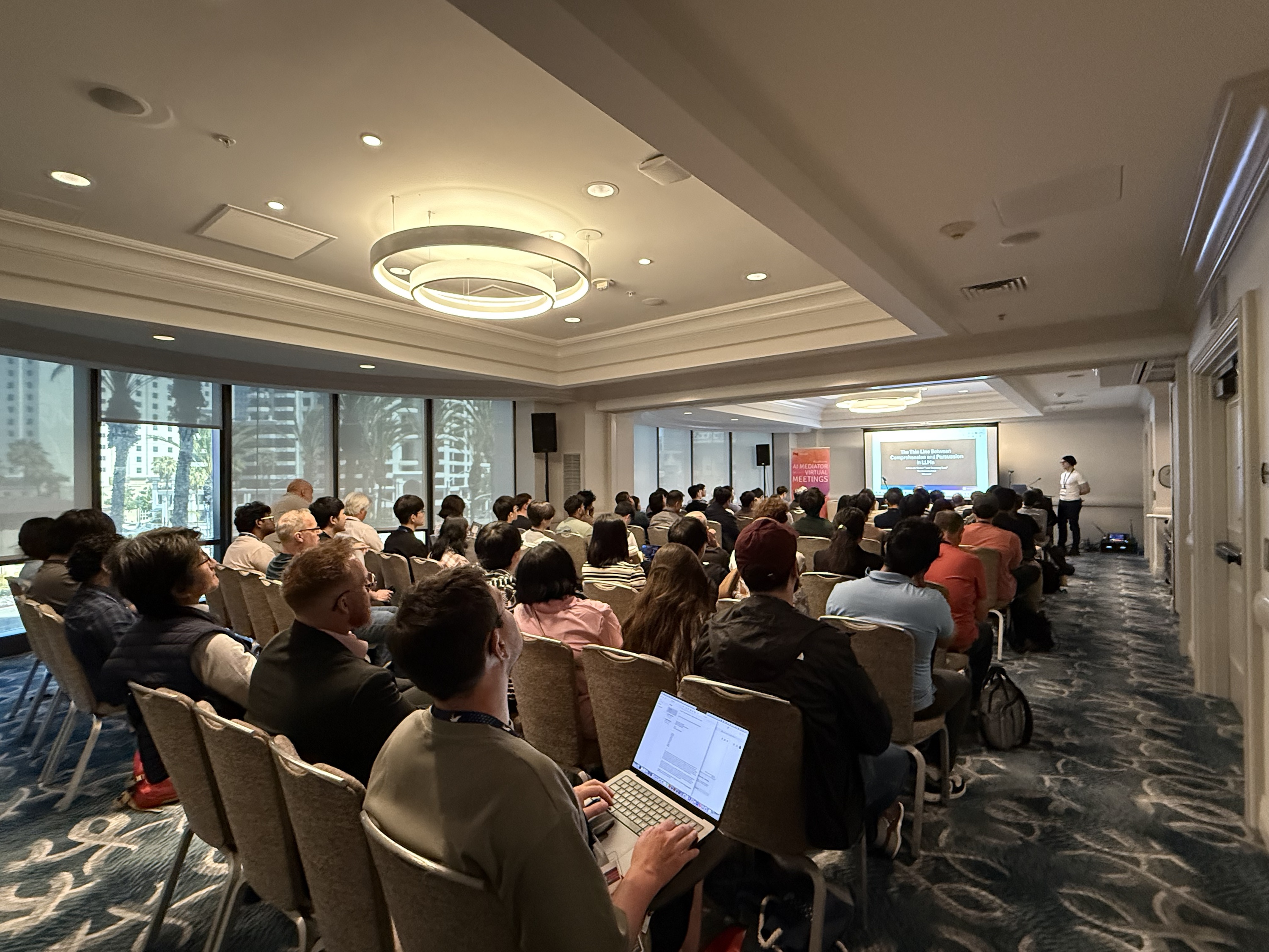 Attendees seated in a conference room during the ACL 2026 Social Agents in the Wild Birds of a Feather session
